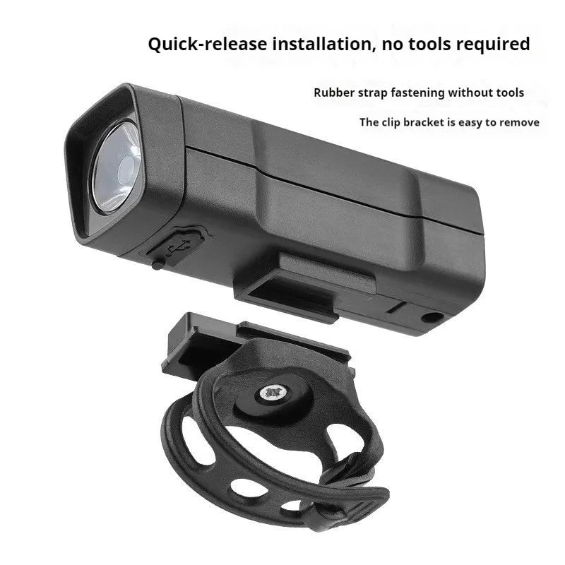 Black USB rechargeable bicycle headlight with quick-release strap mount