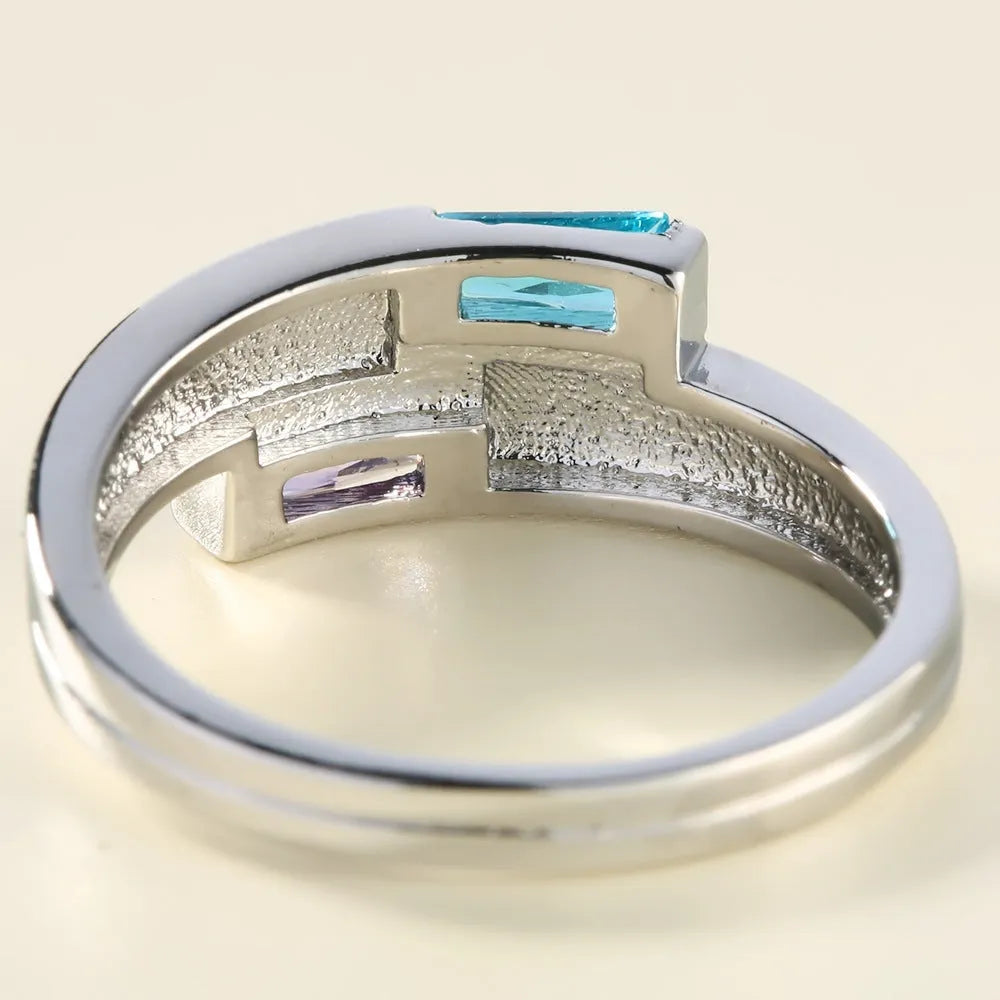 Silver copper ring with zircon stone inlay showing European American unisex design