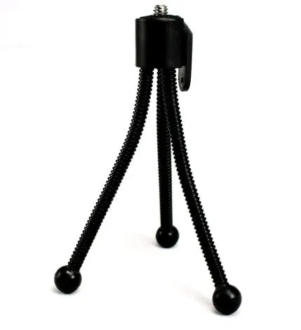 Small black iron frame desktop mini tripod with ball head, shown folded to its 110mm size.