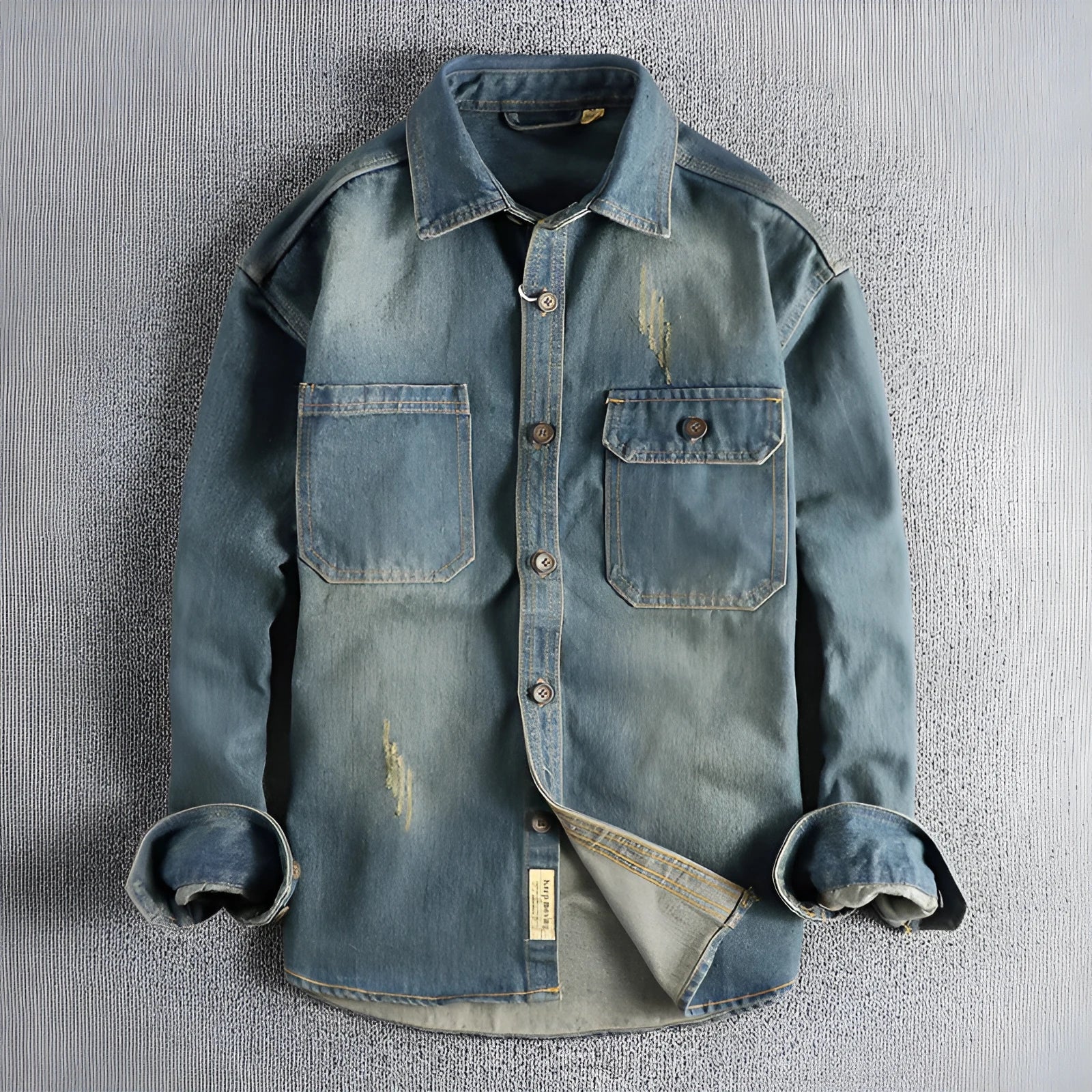 Men's loose-fit washed vintage denim shirt in light blue and dark blue colour options.