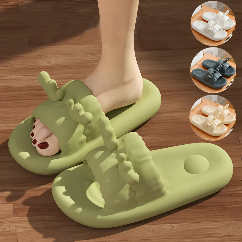 Women's deer horn design flip flop slippers in light yellow EVA material with hollow-out pattern.