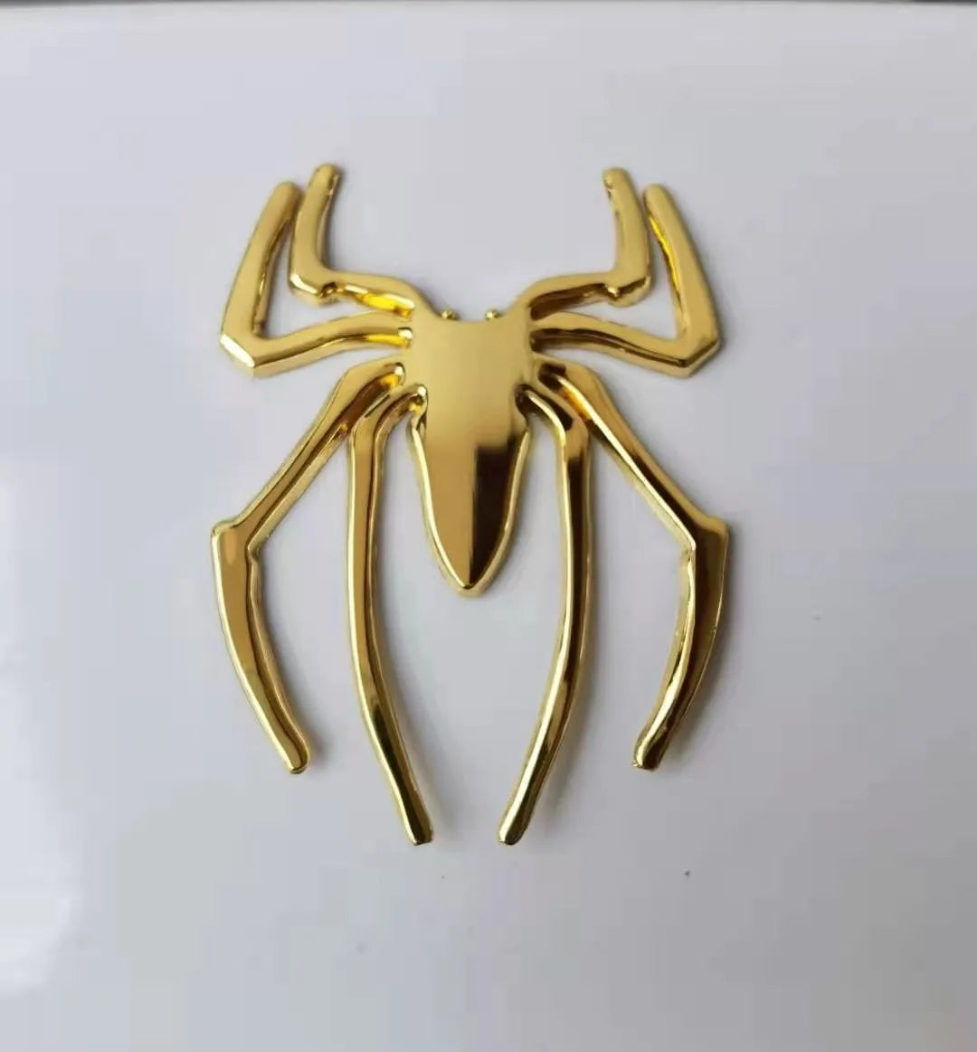 Gold zinc alloy metal spider decorative sticker on a white background