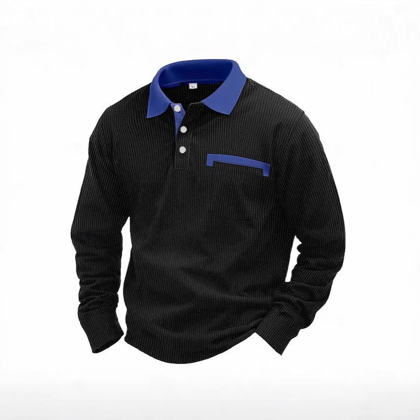 Man wearing a long-sleeved waffle-textured polo shirt in a loose fit with an asymmetric design detail.