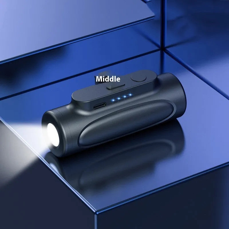 Black creative power bank with LED flashlight showing Type-C charging port and compact 83mm size