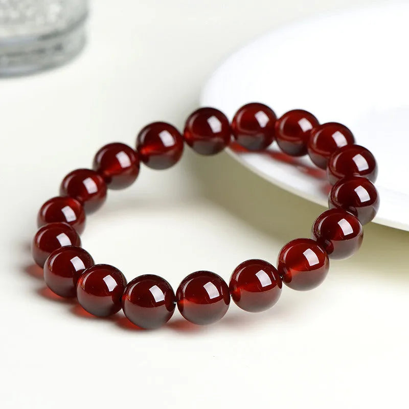 Natural orange red garnet crystal bracelet with Ruyi decorative elements in retro ball design
