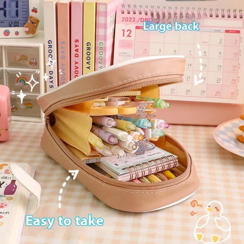 Transparent cartoon pencil case showing interior storage space with zippered closure