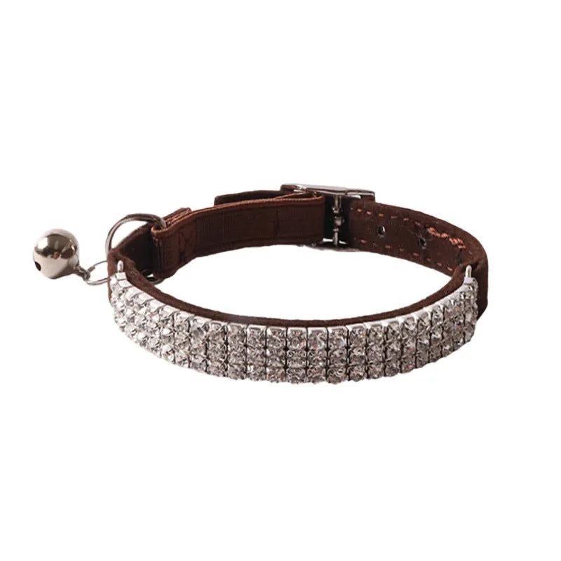 Elastic buckle cat collar in assorted colours with breakaway clasp, showing flocked material texture