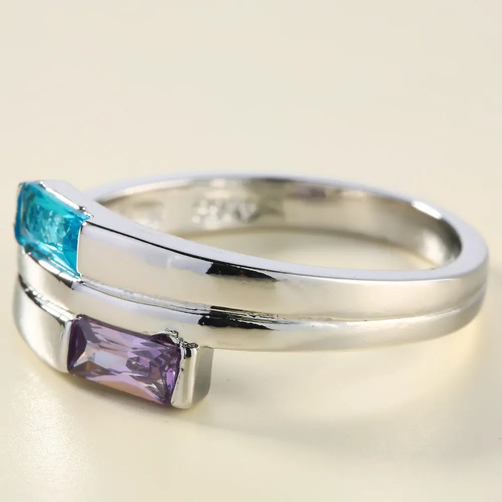 Silver copper ring with zircon stone inlay showing European American unisex design