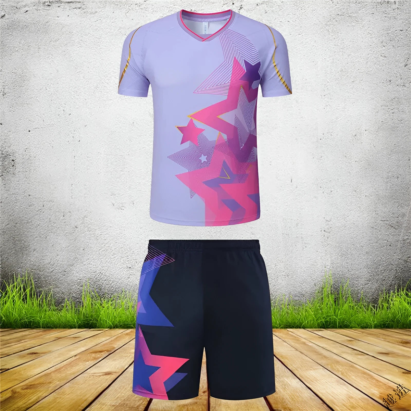 Man and woman wearing short-sleeved blue and purple badminton sportswear outfits, consisting of a top and trousers.