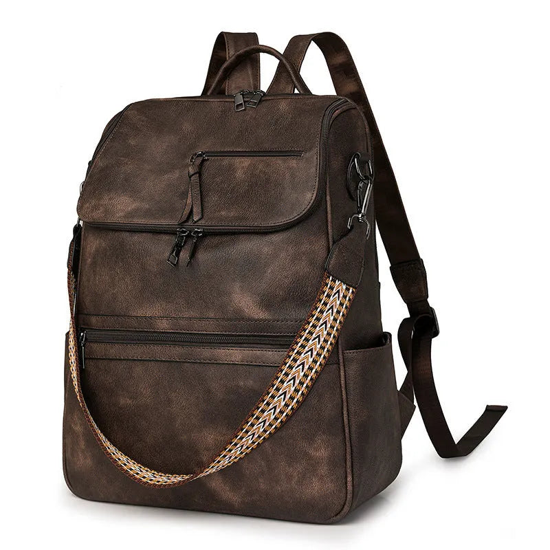 Retro style PU leather college backpack with curved shoulder straps, shown in one of six colour options.