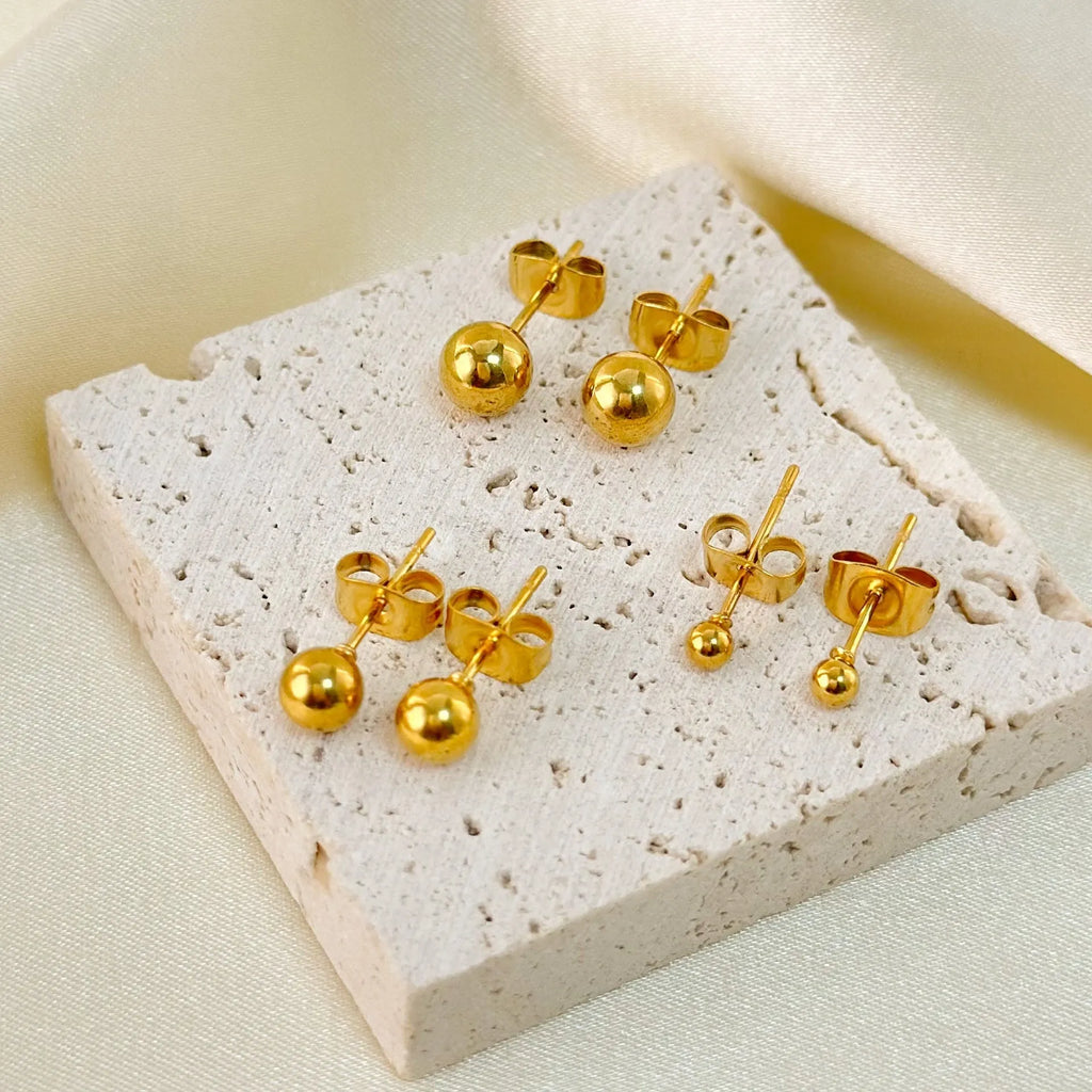 Stainless steel ball stud earrings in geometric round design with gold electroplating