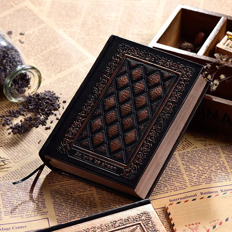 A5 embossed faux leather notebook with a thick cover in bronze or black gold colour.