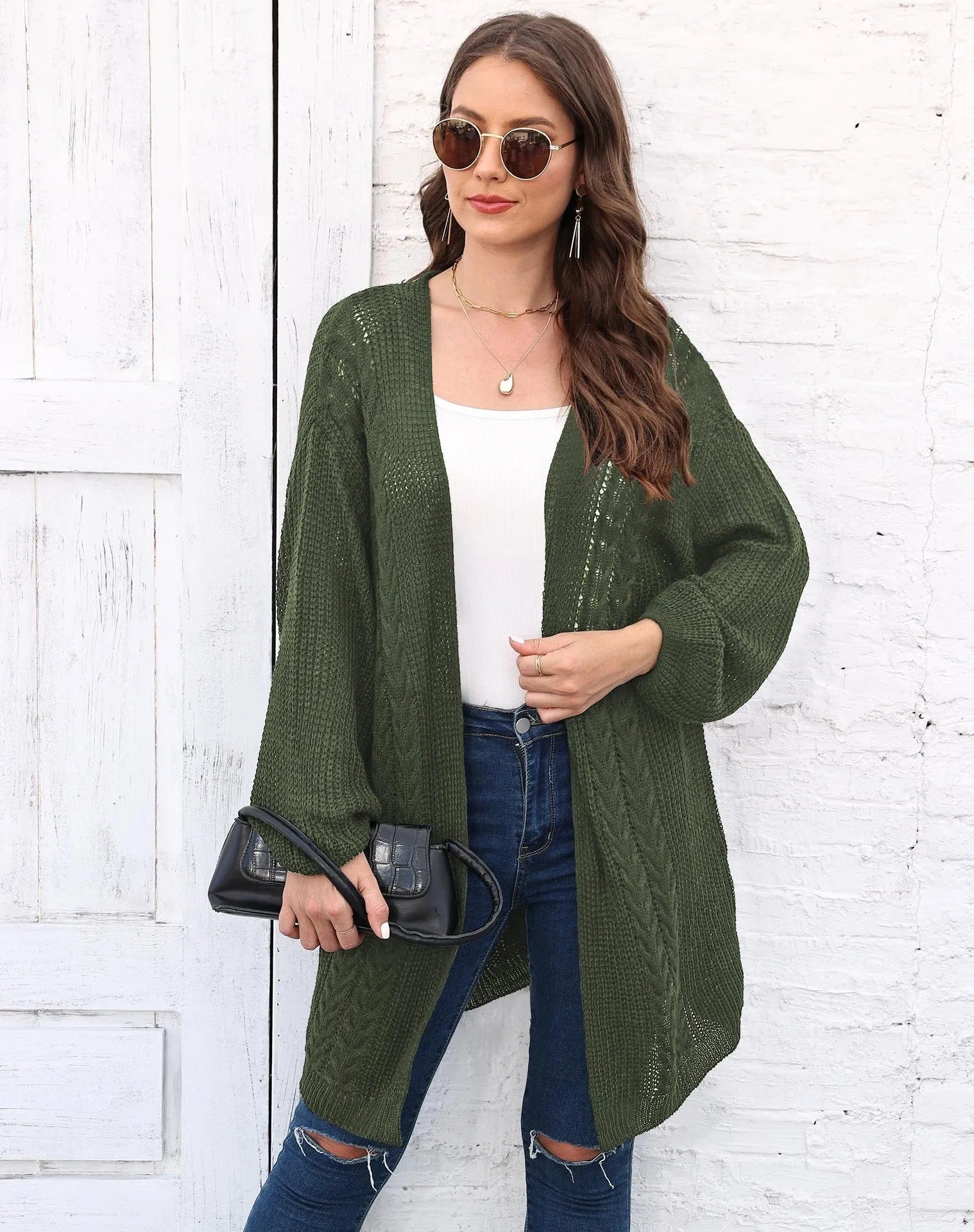 Women's loose fit acrylic sweater coat in army green, shown front on, casual style.