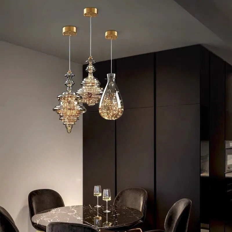Modern glass droplight chandelier with adjustable height in contemporary lighting design