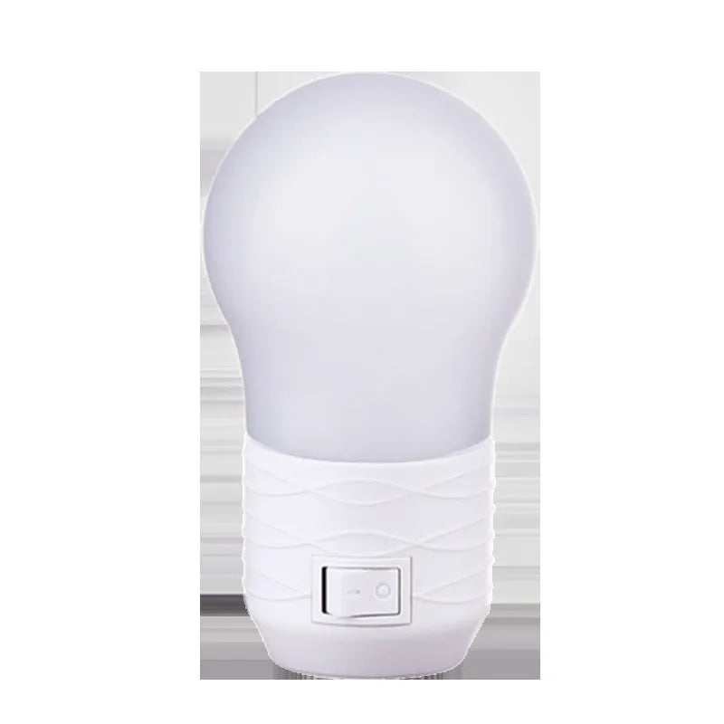 Plug-in bedside baby night light in round modern design with choice of white, blue or pink shell colours