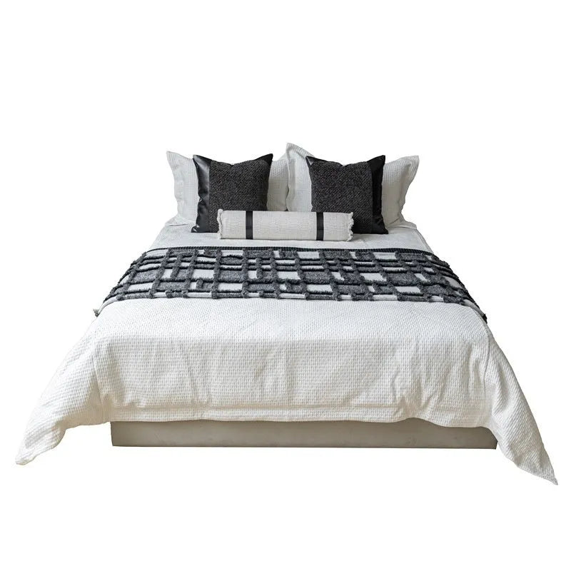 Grey and white plaid polyester bed runner blanket set with pillowcase on a modern double bed.