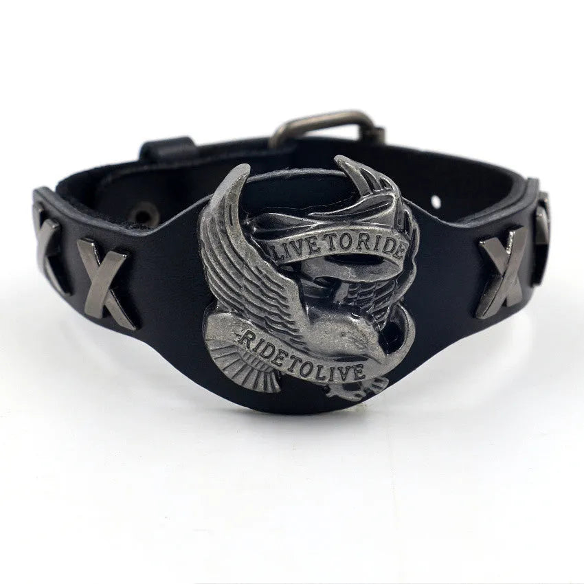 Black geometric leather bracelet with a large alloy eagle watch clasp closure.