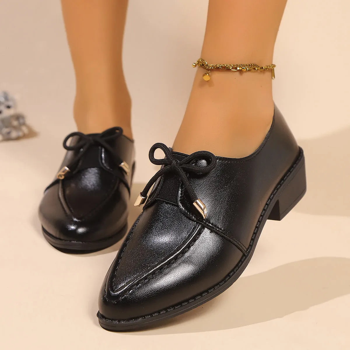 Women's British-style flat shoes with bow detail on PU upper and rubber sole