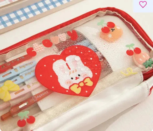 Transparent heart-shaped pen bag with rabbit illustrations in pink or red Korean-style design