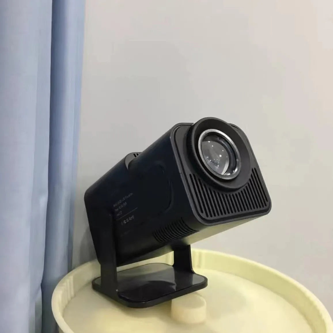 Wireless HD home projector with 720p resolution for gaming and movie viewing
