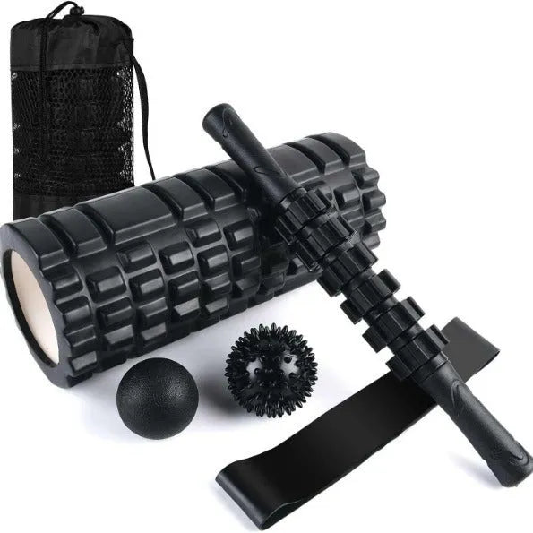Black foam massage roller stick with six textured sections measuring 33cm long