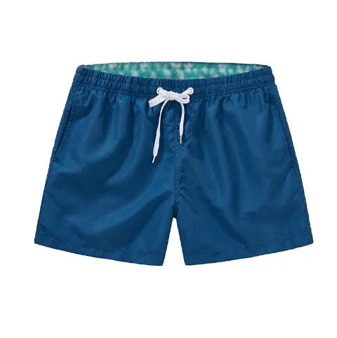 Men's straight-leg beach shorts in polyester fabric, shown in multiple colours and plus sizes.