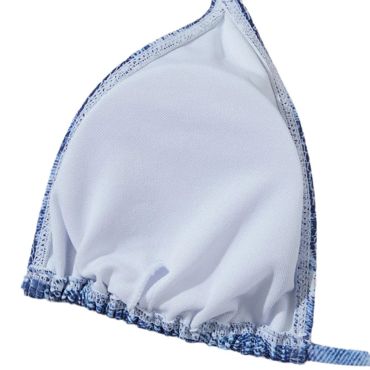 Women's denim blue printed bikini set with adjustable straps on mannequin