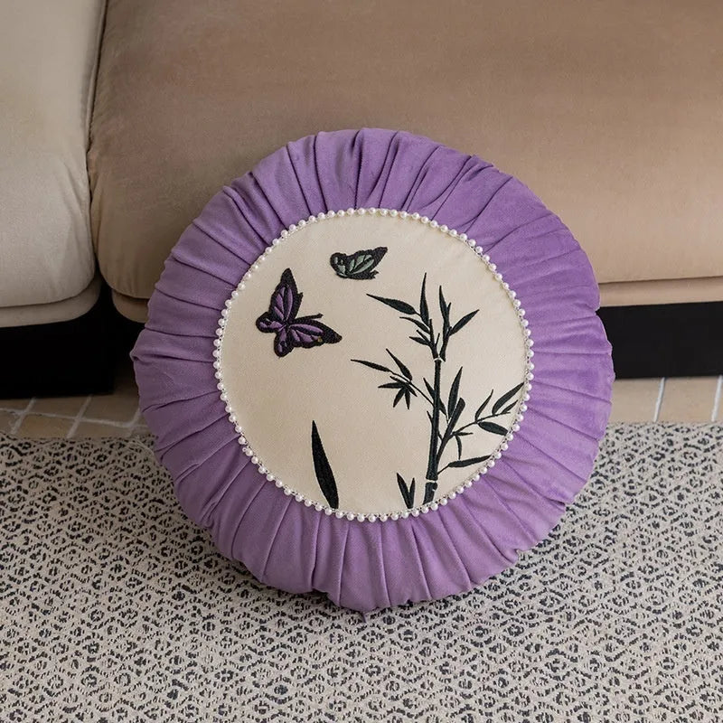 Square beige cushion with embroidered black butterfly in Chinese style pattern