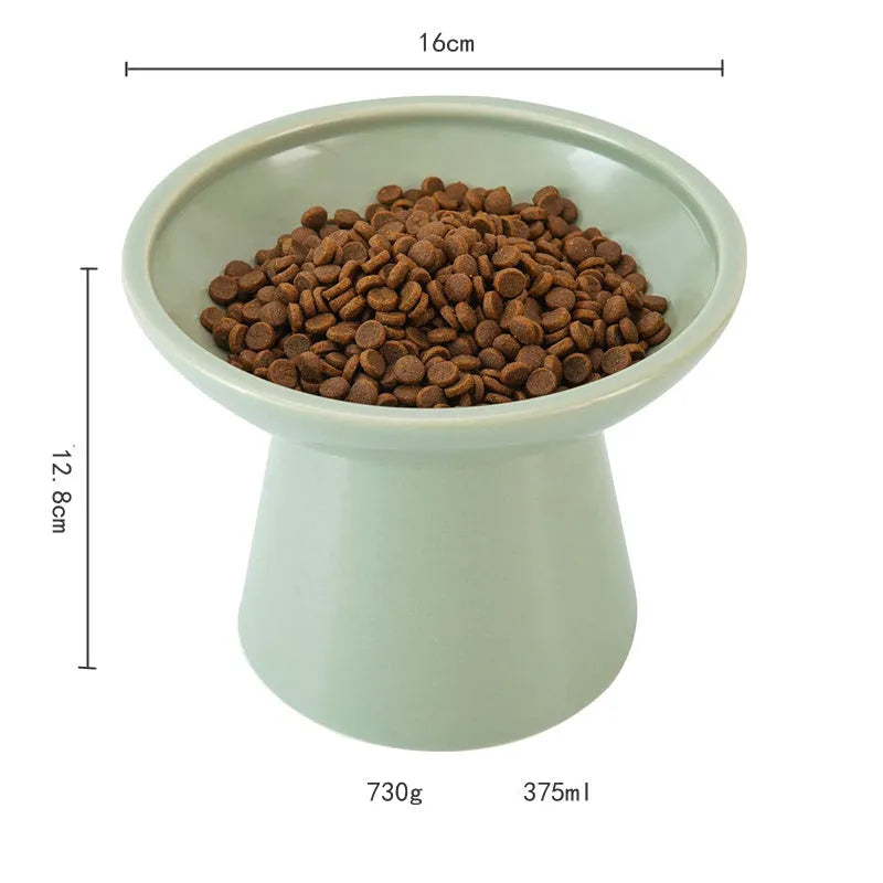 Blue wide ceramic elevated cat food bowl on a white background.