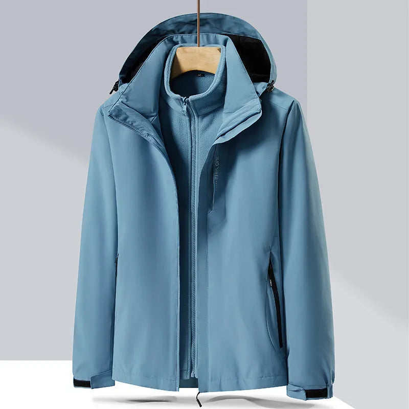 Men's black waterproof mountaineering jacket and trousers set with removable fleece lining.