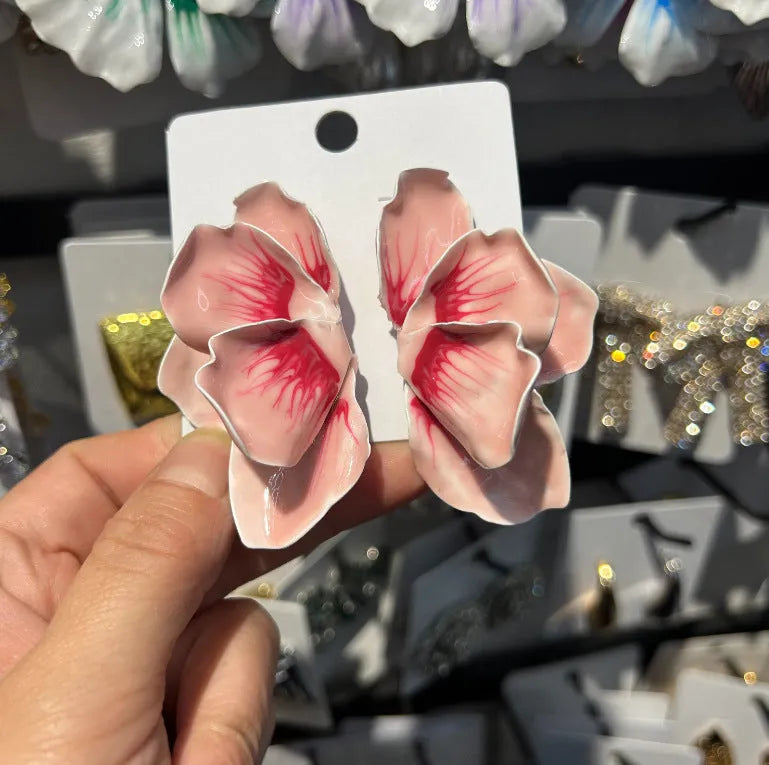 Pastoral style alloy flower stud earrings with oil-spot glaze finish in blue, green, purple, and rose colour options.