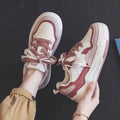 Spring rubber sneaker low top in pink and milky white colours with height increasing function