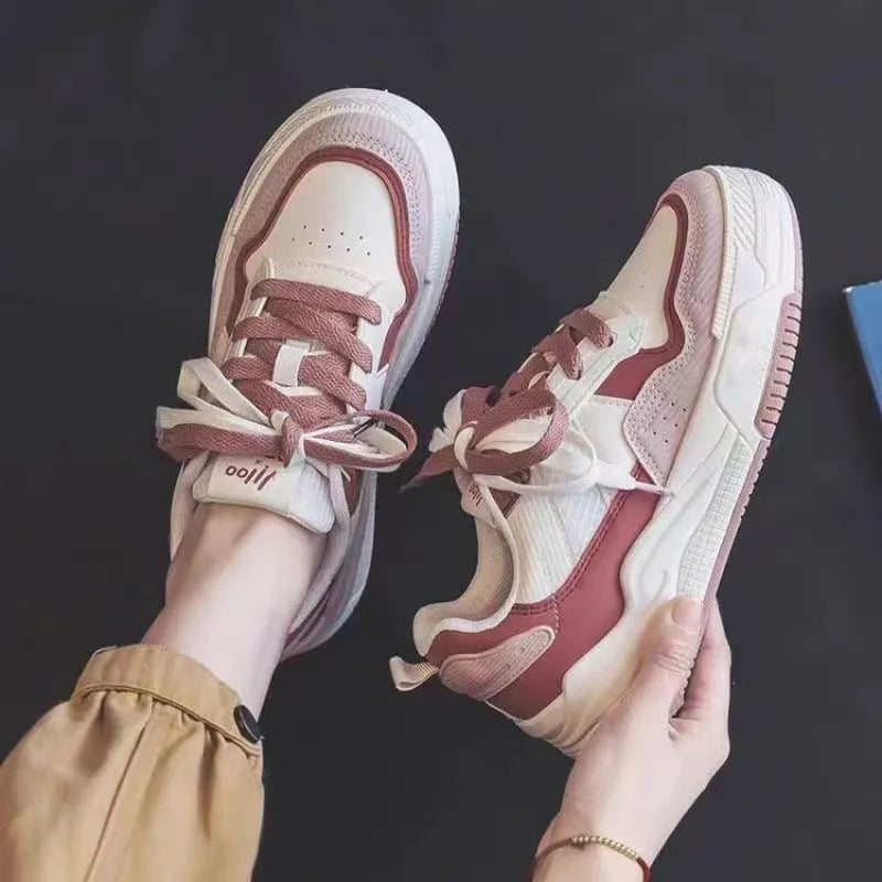Spring rubber sneaker low top in pink and milky white colours with height increasing function