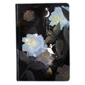 A5 notebook with a luminous cover open to show pages with colour illustrations, in deep blue, gold, light blue, or purple.