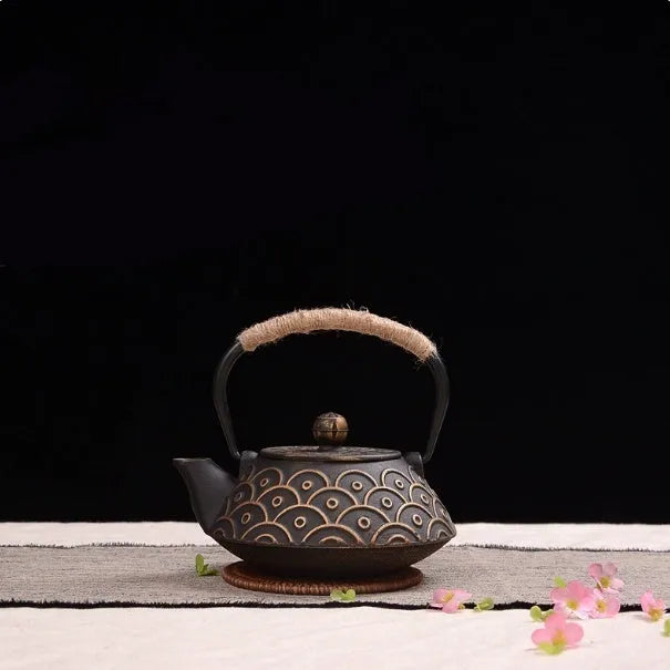 Japanese-style cast iron teapot in a choice of ten patterns, shown in 0.9L size.
