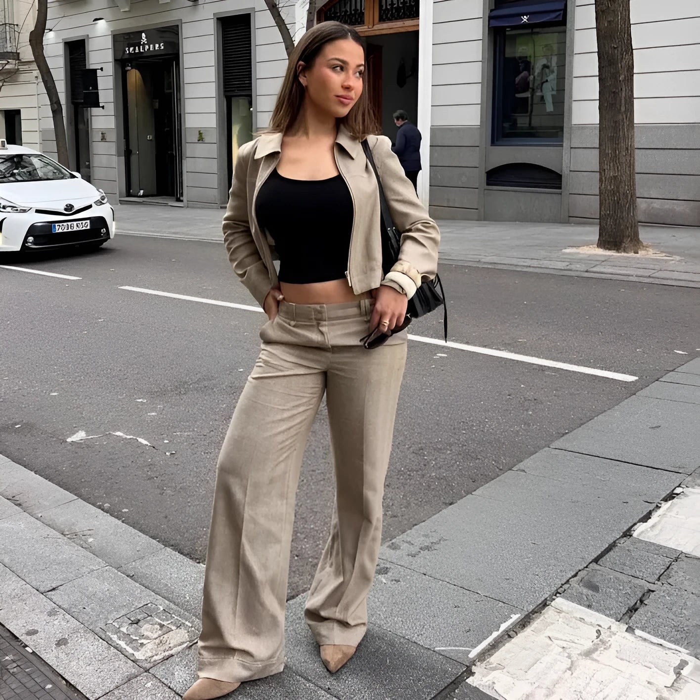 Women's herringbone pattern casual suit with 3D embroidery detailing on jacket and matching trousers