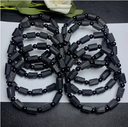 Natural black tourmaline rough stone bracelet with approximately 9mm stones and unisex design