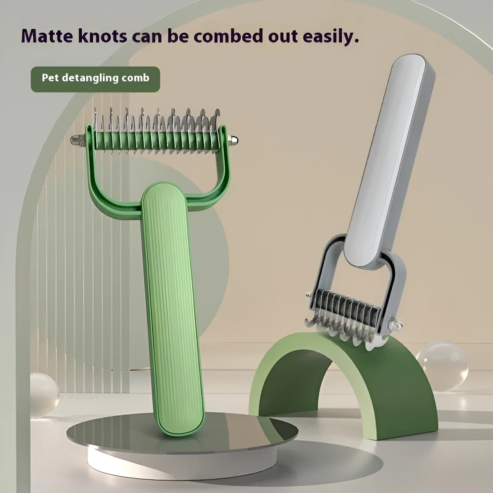 Green and grey pet grooming comb with stainless steel blades for de-tangling dog fur in small and large sizes