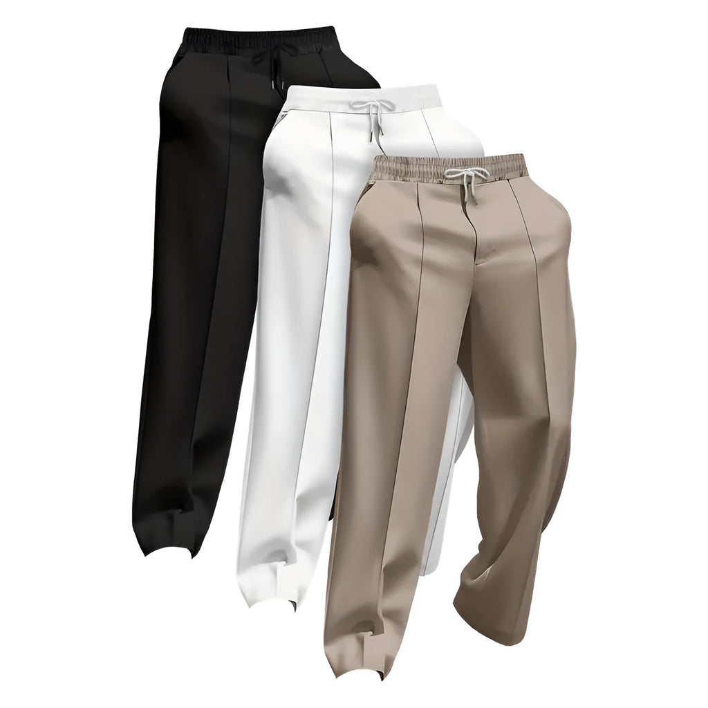 Pack of three men's solid colour loose-fit corduroy trousers on a hanger.