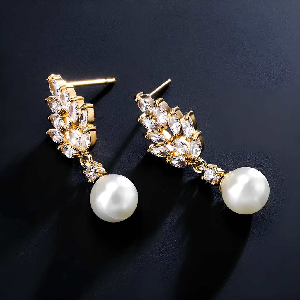 Geometric stud earrings with micro inlaid zircon detailing and floral design in gold, platinum, or rose gold plating
