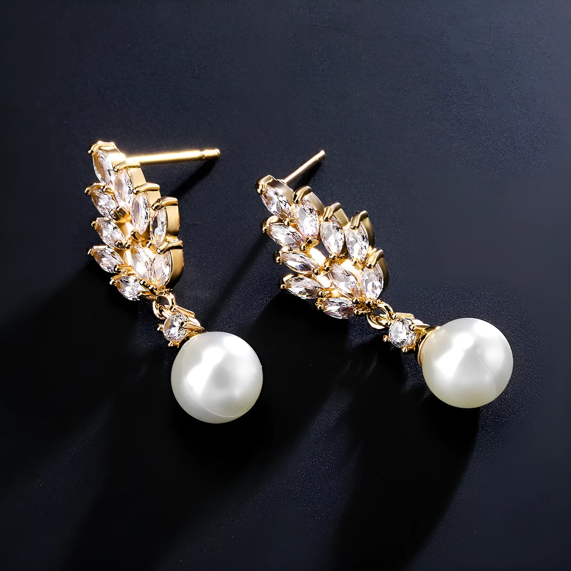 Geometric stud earrings with micro inlaid zircon detailing and floral design in gold, platinum, or rose gold plating