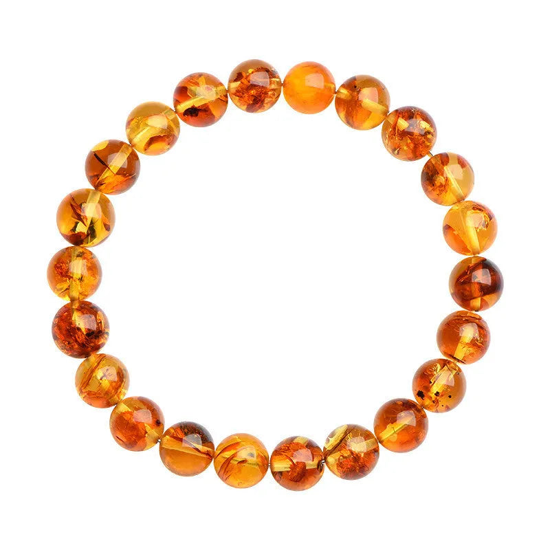 Natural yellow piebald amber geometric bracelet with polished beads