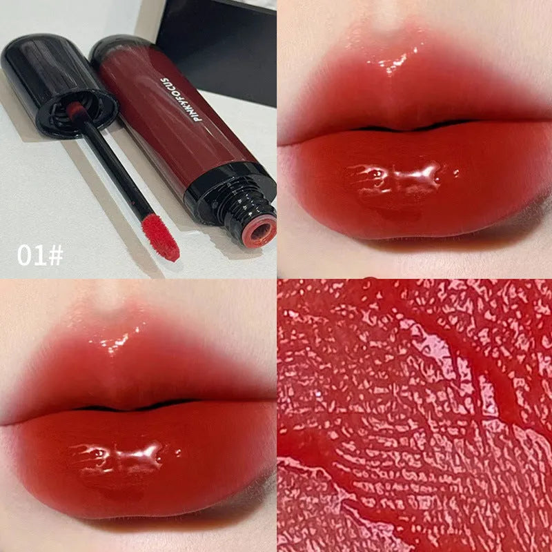 Black shiny mirror lip lacquer cosmetic product showing six colour options including deep reds and browns