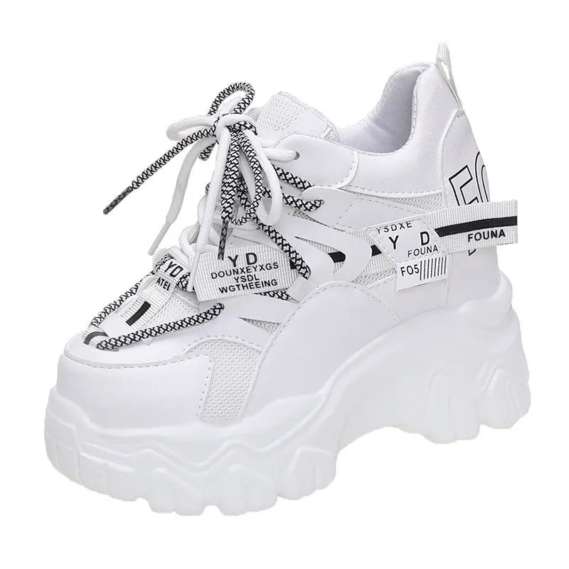 White women's platform tennis shoes with mesh upper and cross strap design