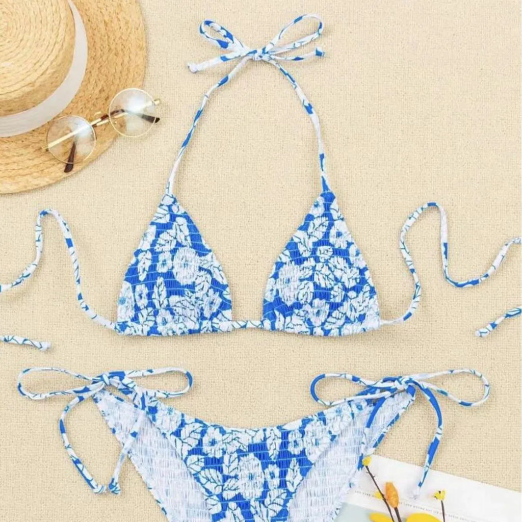 Women's halter neck swimsuit with floral briefs in light blue colour