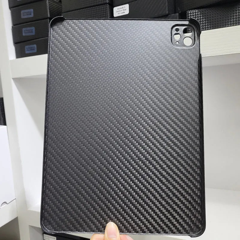 Genuine carbon fibre hard protective case for Apple iPad Pro 11 tablet in matte and forged finishes.
