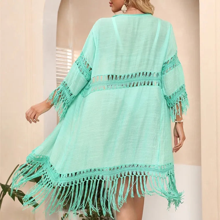 Women's hand-crocheted acrylic beach cover-up cardigan in water green with tassel detail