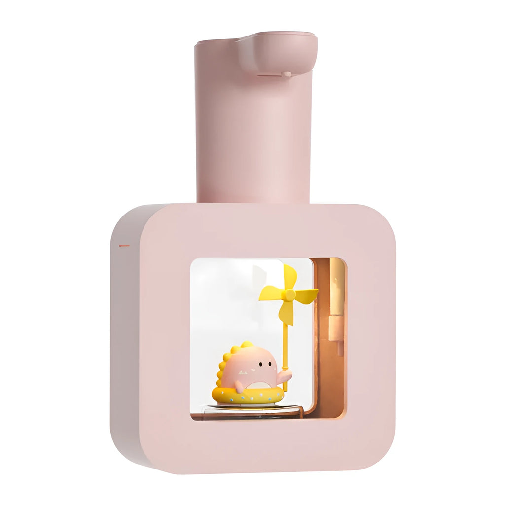 Pink automatic touchless foam soap dispenser for kids with unicorn cartoon design on countertop.