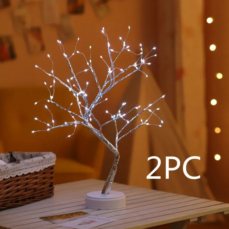 White LED Christmas tree shaped night light with touch base, standing 50cm tall on a table.