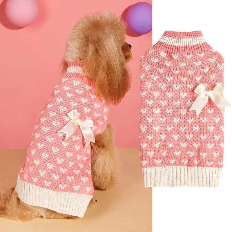 Red love heart motif dog sweater on small dog with bow decoration